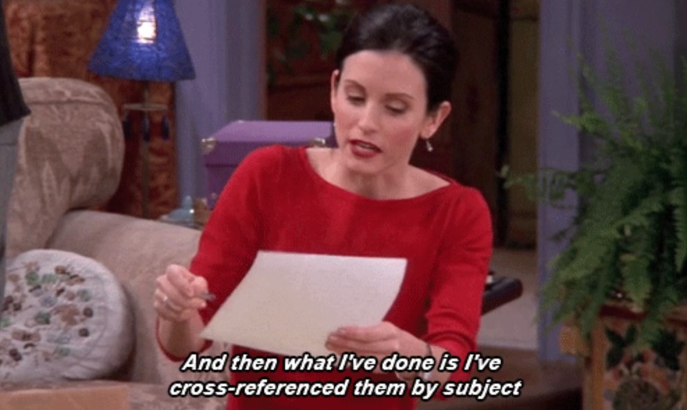 Monica from Friends holding a sheet of paper